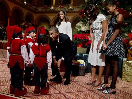 Los Obama van a concierto navideño de caridad Los Obama van a concierto navideño de caridad