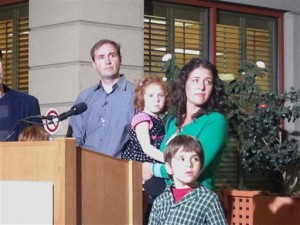 Jessica Tomei holds her 4-year-old daughter, Sofia Jarvis, during a news conference at Lucille Packard Children's Hospital at Stanford University on Monday, Feb. 24, 2014, in Palo Alto, Calif. Sofia is one of a handful of California children who has been diagnosed with a rare polio-like syndrome that has left her arm paralyzed. Stanford researchers say there is a possibility of an emerging infectious polio-like syndrome in California. MARTHA MENDOZA — AP Photo
