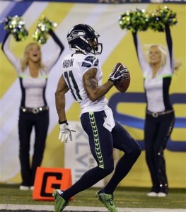 Percy Harvin, de los Seahawks de Seattle, celebra su anotación frente a los Broncos de Denver en el Super Bowl XLVIII, disputado el domingo 2 de febrero de 2014, en East Rutherford, Nueva Jersey (AP Foto/Ben Margot)