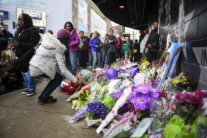 Fans lay flowers and memorials outside First Avenue, the nightclub where Prince got his start in Minneapolis, Minnesota. REUTERS/Craig Lassig
