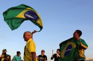 Demonstrators who support Brazil's President Dilma Rousseff's impeachment react in Brasilia, Brazil, May 12, 2016. REUTERS/Paulo Whitaker
