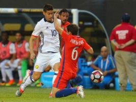 Jun 22, 2016; Chicago, IL, USA; Colombia midfielder James Rodriguez (10) kicks past Chile midfielder Jose Pedro Fuenzalida (6) during the first half in the semifinals of the 2016 Copa America Centenario soccer tournament at Soldier Field./ Dennis Wierzbicki-USA TODAY Sports