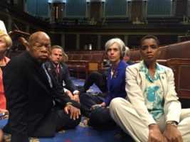 A photo tweeted from the floor of the U.S. House by Rep. Donna Edwards (R) shows Democratic members of the U.S. House of Representatives, including herself and Rep. John Lewis (L) staging a sit-in on the House floor "to demand action on common sense gun legislation" on Capitol Hill in Washington, United States, June 22, 2016. REUTERS/Rep. Donna Edwards/Handout
