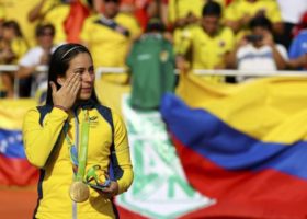 2016 Rio Olympics - Cycling BMX - Victory Ceremony - Women's BMX Victory Ceremony - Olympic BMX Centre - Rio de Janeiro, Brazil - 19/08/2016. Gold medalist Mariana Pajon (COL) of Colombia reacts on podium. REUTERS/Paul Hanna