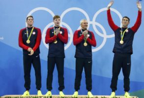 Michael Phelps, Conor Dwyer, Townley Haas and Ryan Lochte celebrate REUTERS/David Gray