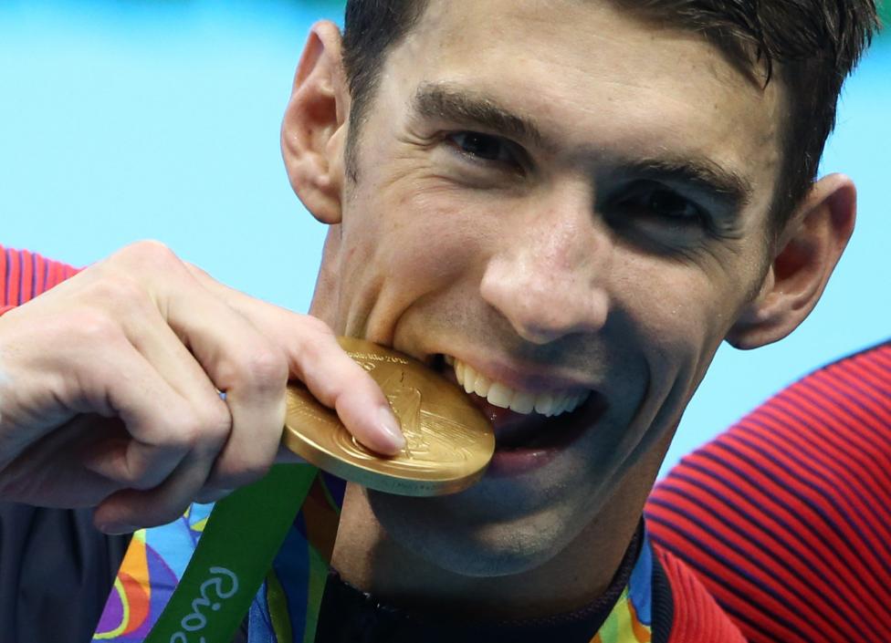 Phelps gana su medalla de oro número 21 Phelps gana su medalla de oro número 21