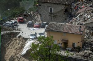 Rescuers work following an earthquake in Pescara del Tronto, central Italy. REUTERS/Adamo Di Loreto