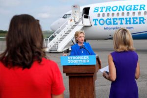 Democratic presidential candidate Hillary Clinton holds a news conference on the airport tarmac in front of her campaign plane in White Plains. REUTERS/Brian Snyder
