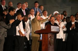 Cuban President Raul Castro acknowledges the applause from the crowd as he attends a massive tribute to Cuba's late President Fidel Castro in Revolution Square in Havana. REUTERS/Carlos Garcia Rawlins